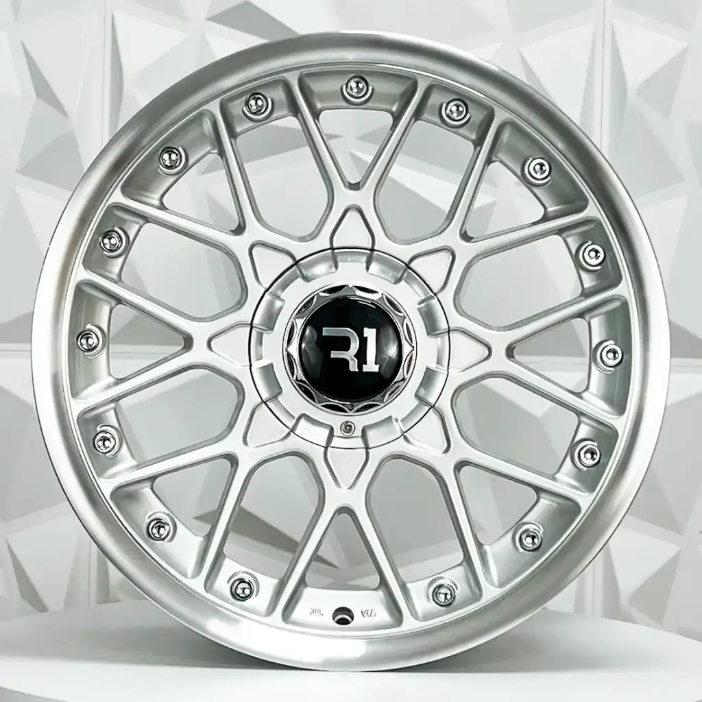 RIN 17X9 4-100/114.3 R1 SPORT QC1198 SILVER MI CHROME RIVETS ET25 CB73.1